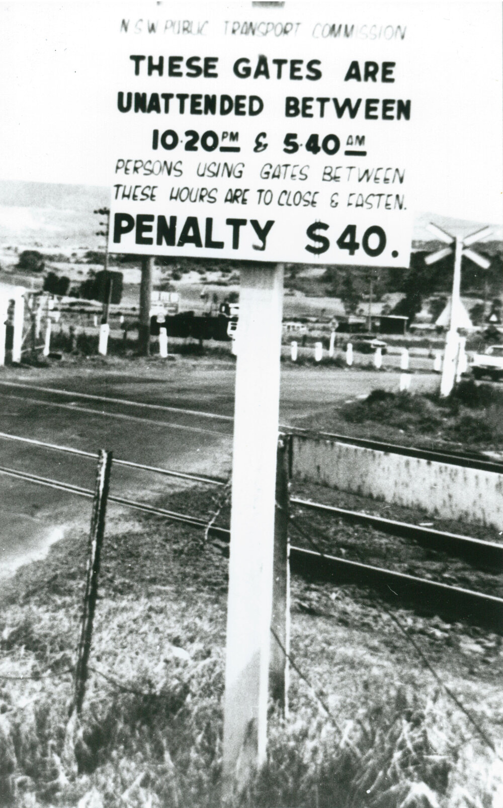 Sign at the railway crossing at Dunmore