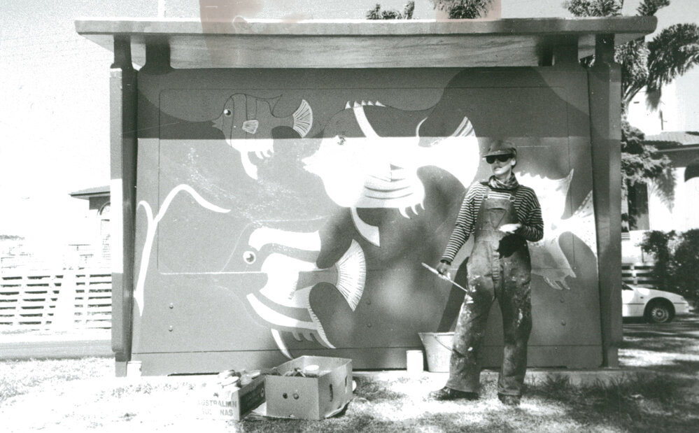 Painting the bus shelter at Shellharbour foreshore