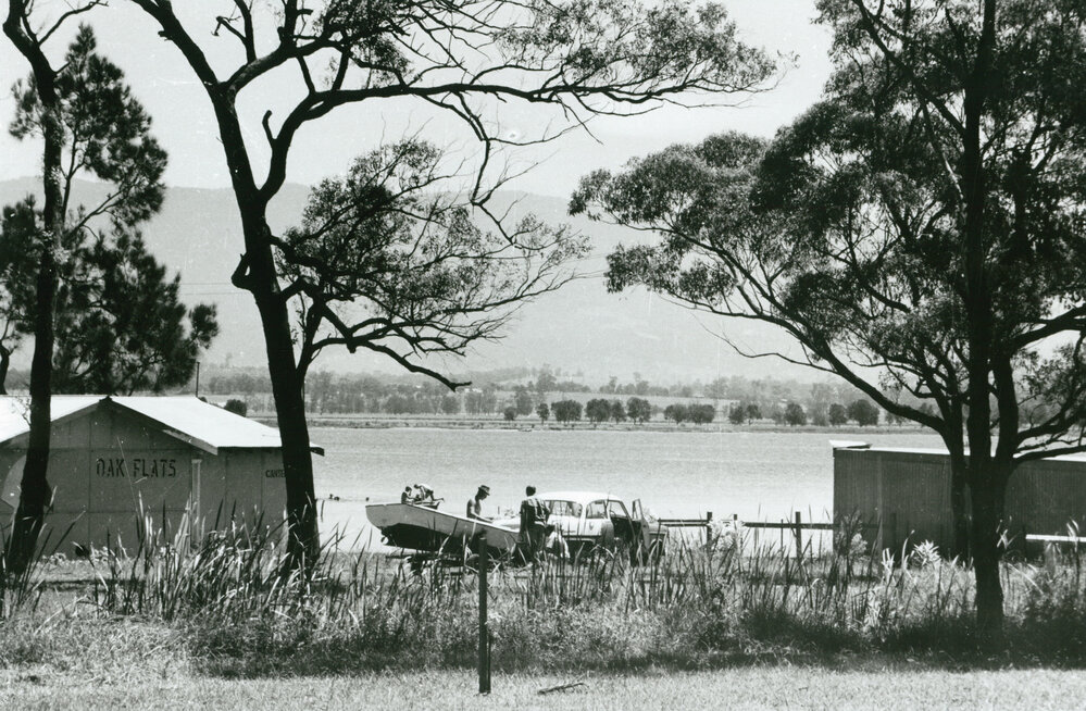 Launching a boat at Deakin Reserve, Oak Flats