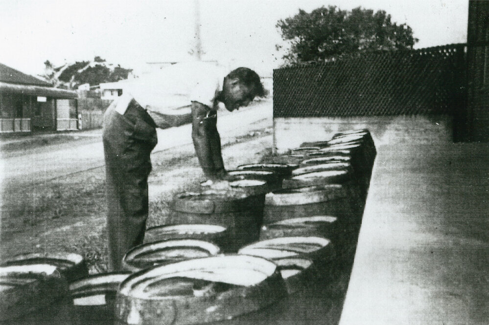 Stacking beer kegs at Ocean Beach Hotel, Shellharbour 1947