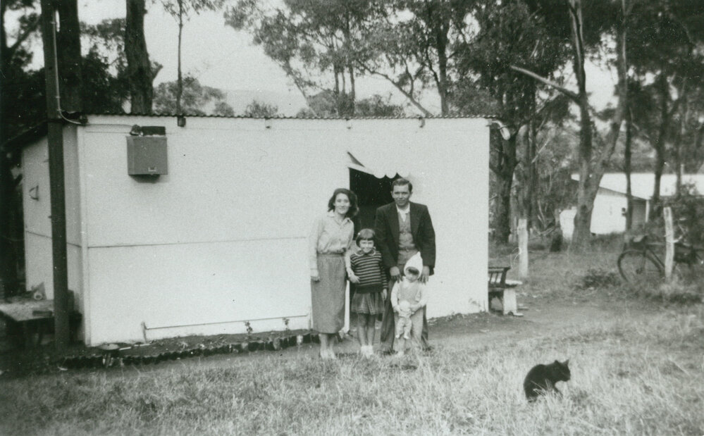Group outside the garage where the Havasi Family lived in Oak Flats