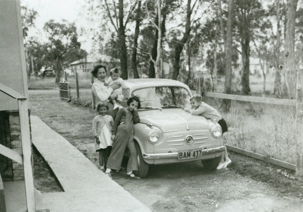 The Feher Family visiting from Sydney, with their car, a Fiat 500