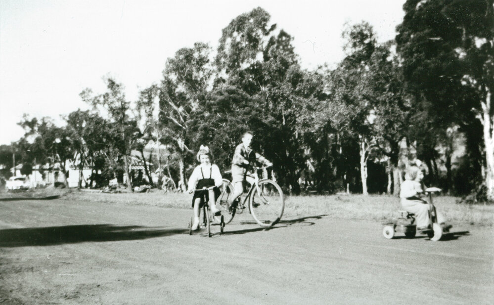 The Kirchmajer children riding bikes in Oak Flats