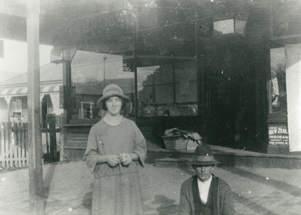 Sheila Timbs and William George Harris outside William Buchanan's Emporium, Albion Park