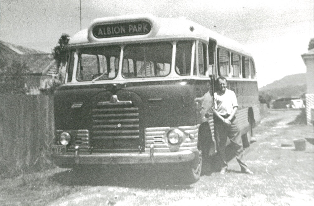 Barry Brownlee beside his Bedford Bus, Albion Park