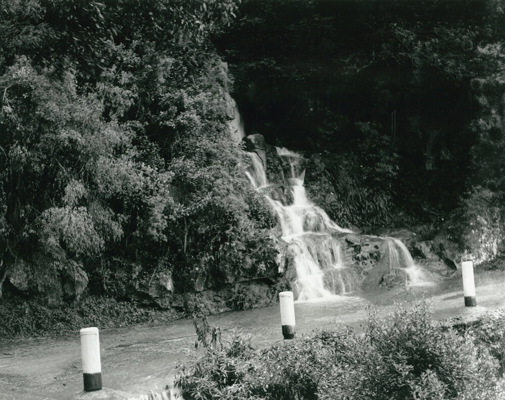 Waterfall over the road at  Macquarie Pass in the 1920's