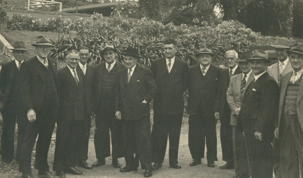 Mayor Keith Grey, Premier J. J. Cahill, Aldermen and officials gathered outside the Ocean Beach Hotel