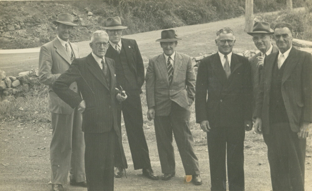 Aldermen and officials gathered outside the Ocean Beach Hotel