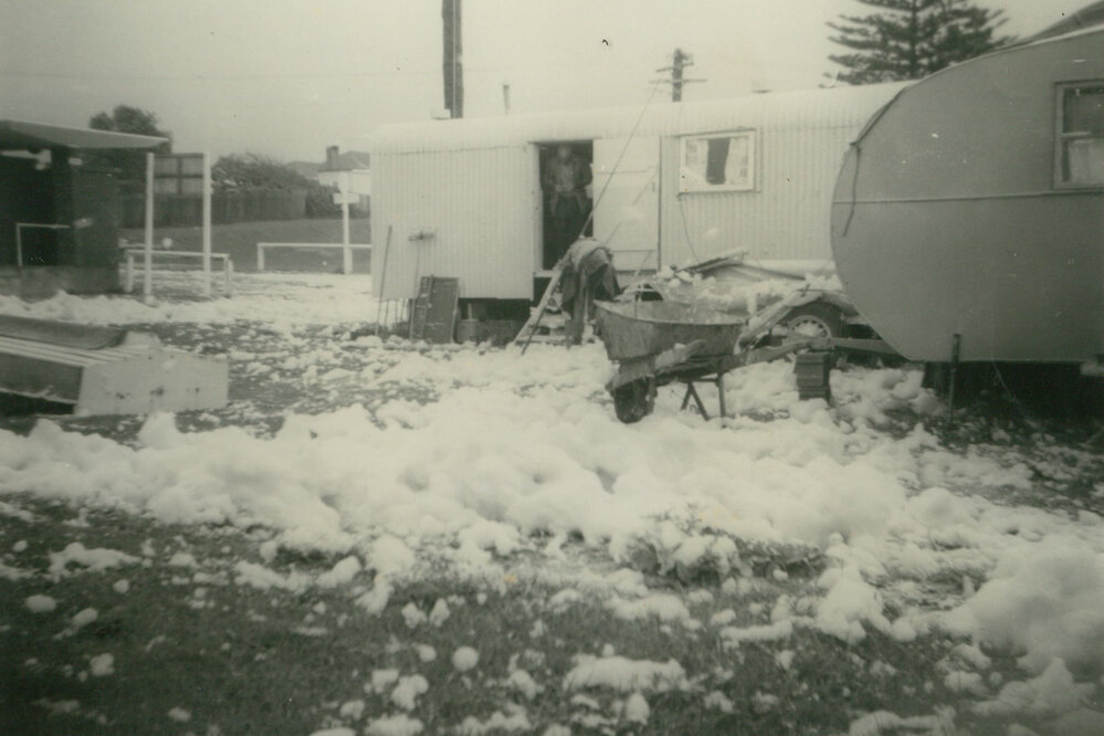 Foam from rough seas flowing through Bassett Park Camp Ground, Shellharbour