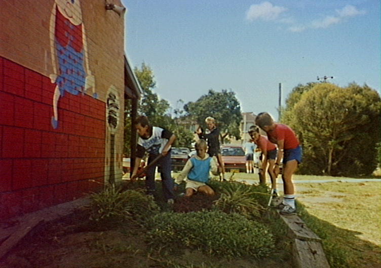 Pupils planting trees at Barrack Heights Public School