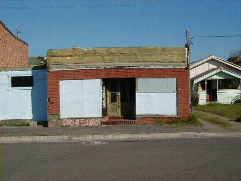 Building adjoining take-away shop, Reddall Parade