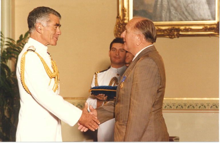Fritz Fischer receiving his Order of Australia award from NSW Governor David Martin