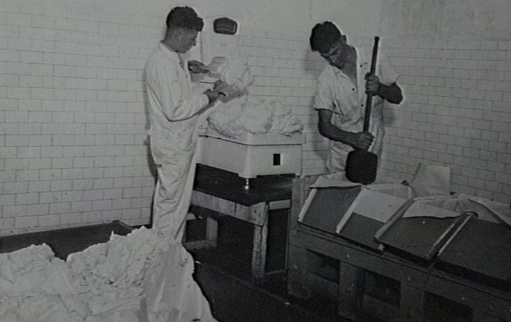 Noel Prior (left) and Brian Walsh packing butter, Illawarra Cooperative Central Dairy factory