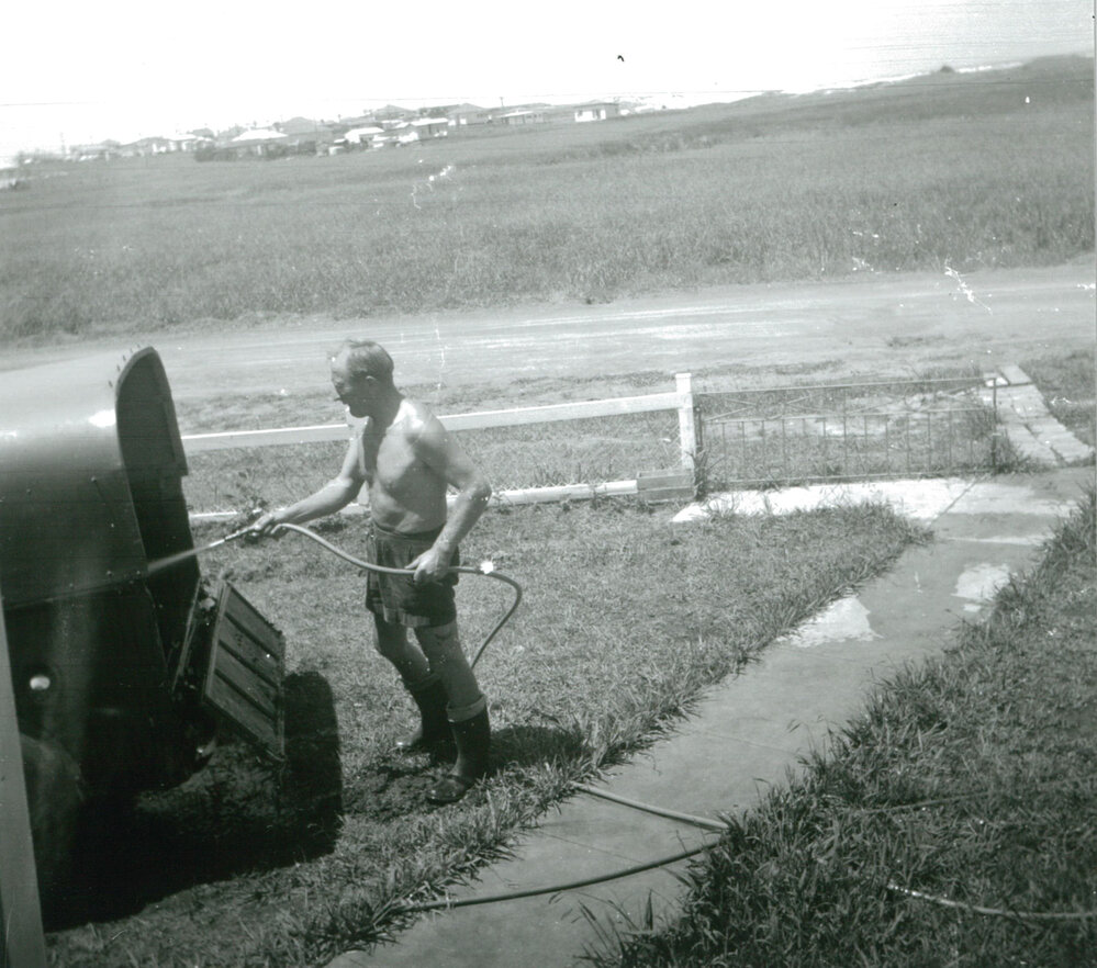 Fritz Fisher hosing a trailer