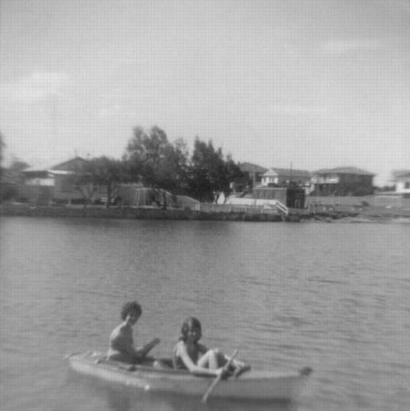 Girls paddling a canoe on Little Lake
