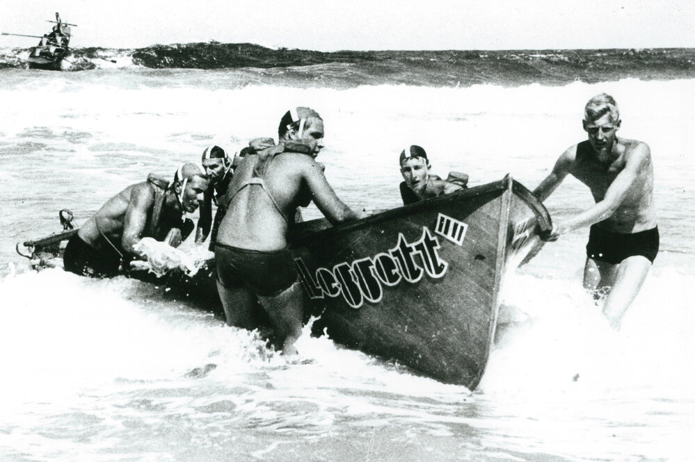 Warilla Barrack Point surf boat crew at Warilla Beach surf carnival mid 1960s