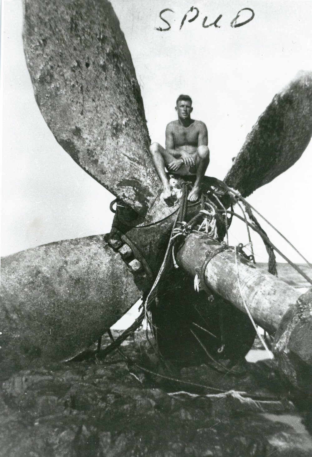 Bernard 'Spud' Costello on the propeller of the shipwreck 'Cities Service Boston'
