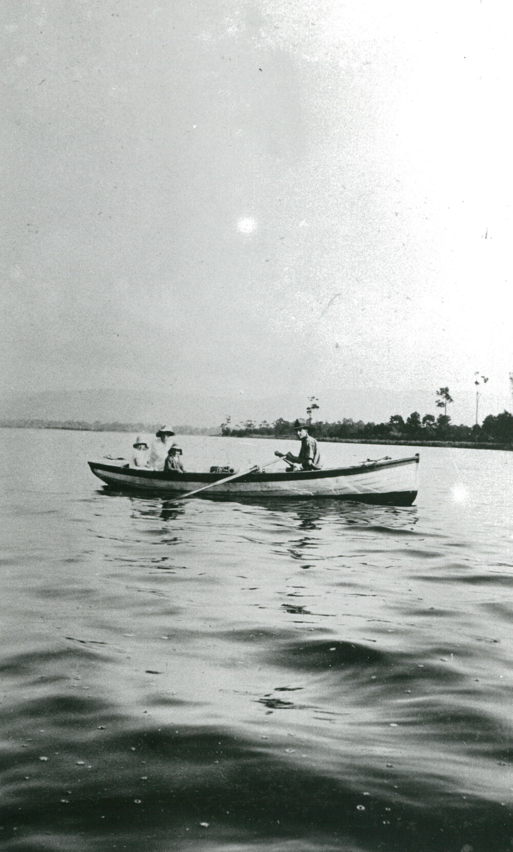 The McIlquham Family in a rowboat on Lake Illawarra 1934