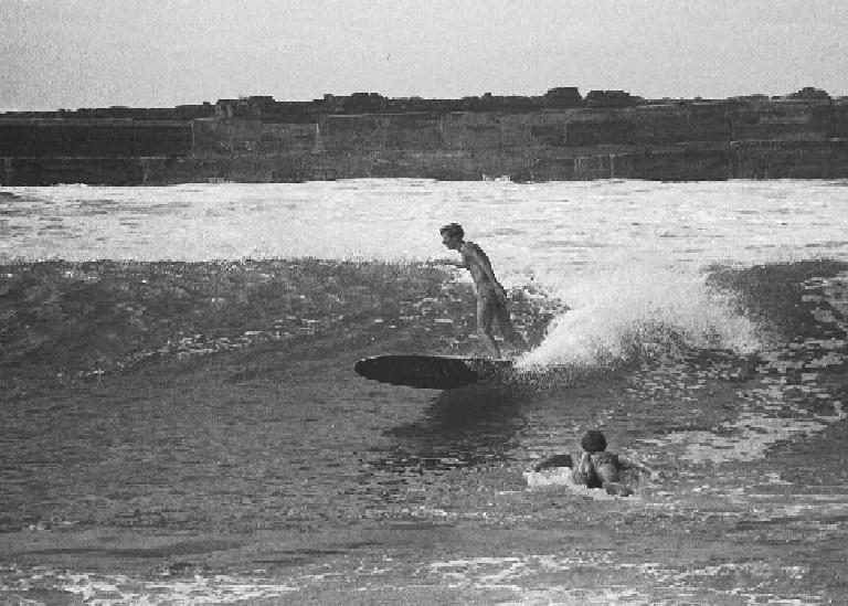 Ken Middleton surfing at Shellharbour Harbour 1966