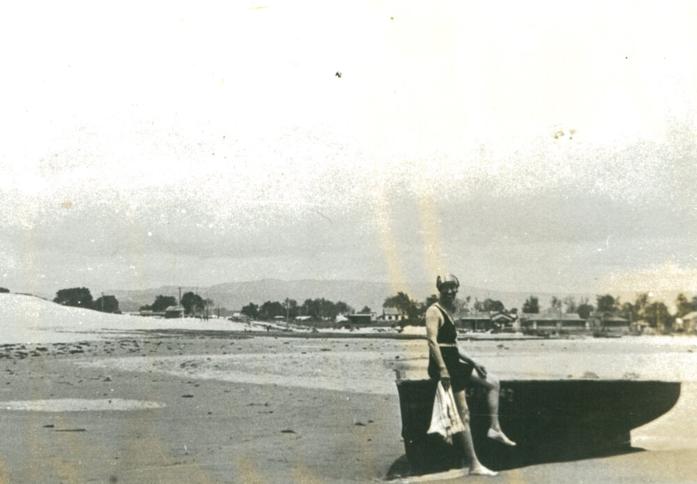 Bather at the entrance to Lake Illawarra