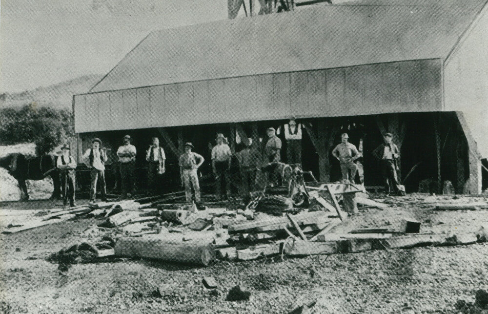 Workers at the crushers of the blue metal quarry