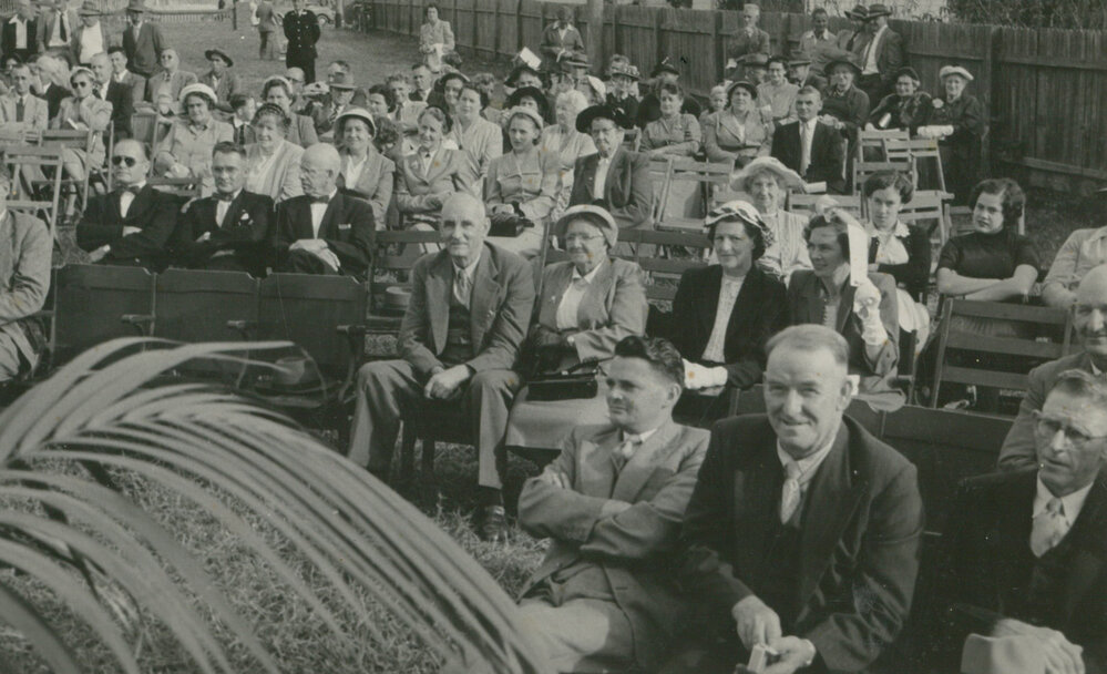 Spectators at the official turning-on of the water supply at Albion Park