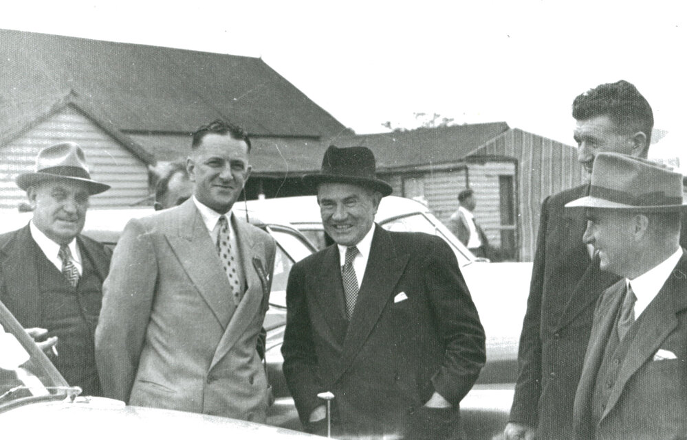 MP Howard Fowles, Bob Graham (Manager Illawarra Cooperative Central Dairy factory), J. J. Cahill (NSW Premier) and Keith Grey (Mayor)