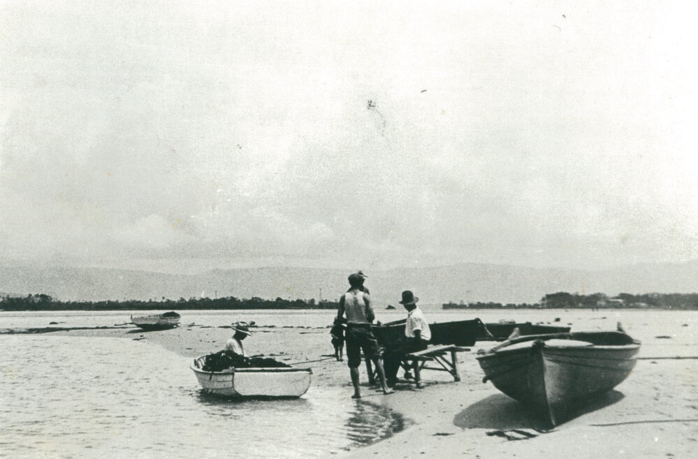 Fishermen at the lake entrance