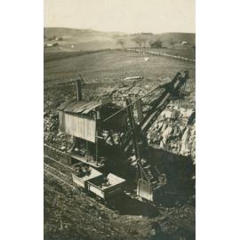 Rail Crane Lifting Trucks Back On To The Line After A Derailment Near Dunmore.