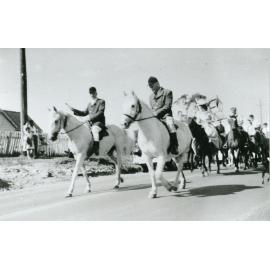 Darcy Dunster and Patrick O'Gorman leading the Centenary Parade at Albion Park