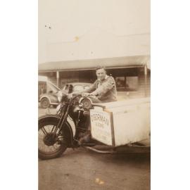 Austin O'Gorman delivering meat on a 1939 Harley Davidson bike