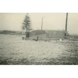 Foam from rough seas flowing through Bassett Park Camp Ground, Shellharbour