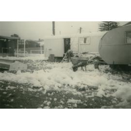 Foam from rough seas flowing through Bassett Park Camp Ground, Shellharbour