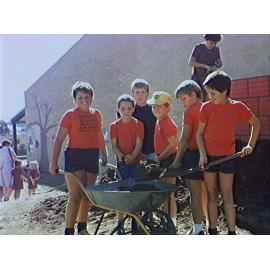 Barrack Heights Public School children preparing the garden bed