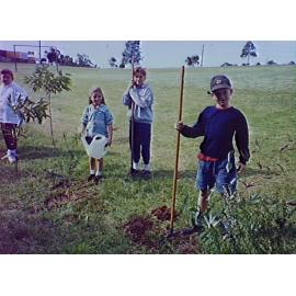 James McKinley tending trees at Barrack Heights Public School 1994