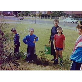 Children tending trees at Barrack Heights Public School