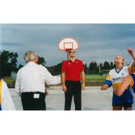 Mayor Cec Glenholmes with basketball players at Warilla Basketball Court