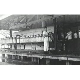 Brian Walsh washing milk cans at Illawarra Cooperative Central Dairy factory