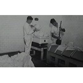 Noel Prior (left) and Brian Walsh packing butter, Illawarra Cooperative Central Dairy factory