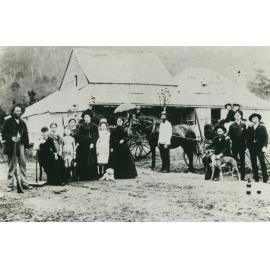 Family group outside what is possibly the Tongarra Creamery, Tongarra