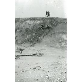 Sledding down the Sand Hills
