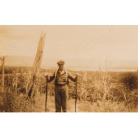 Charlie Jesse with Two Black Snakes